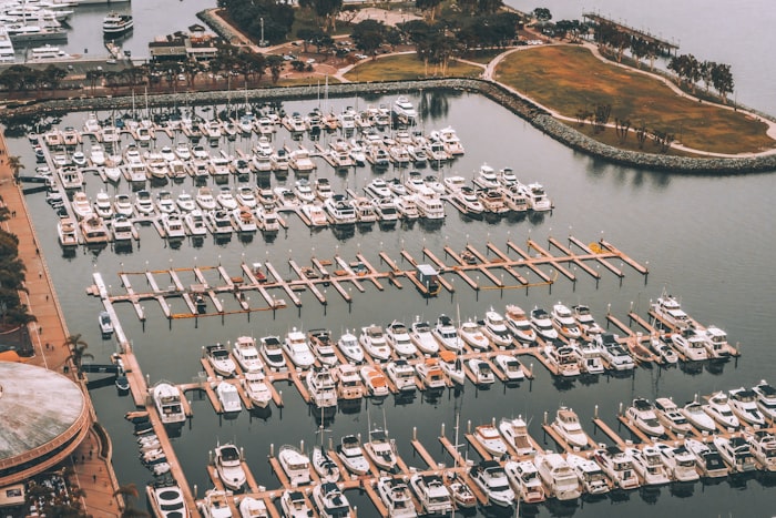 New and used boat engines side by side on a dock