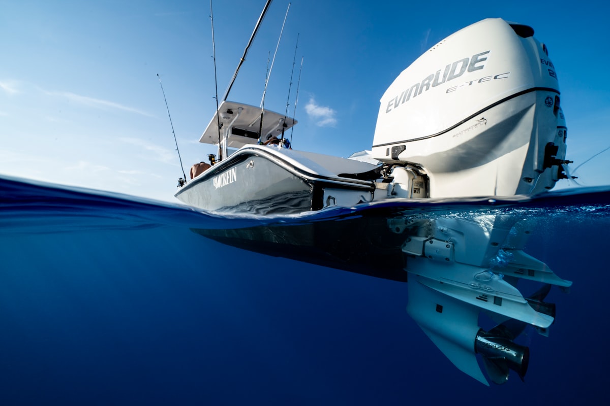 Boat outboard engine mounted on the transom of a fishing boat